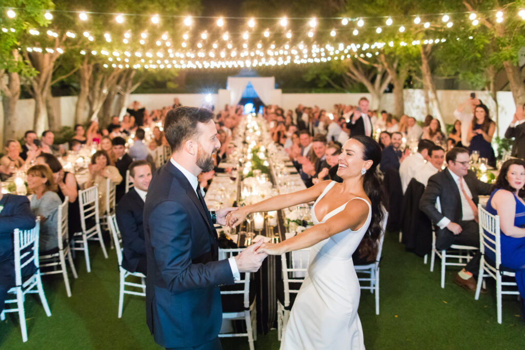 bride and groom dance at luxury wedding reception at Avalon Palm Springs